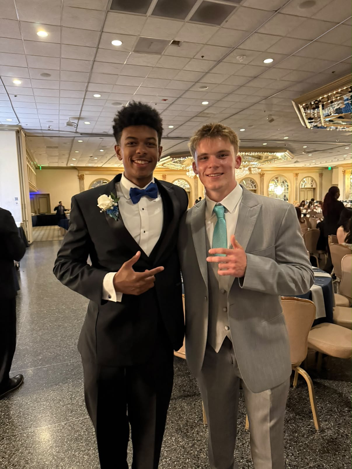 Jake and a friend dressed for a formal school event